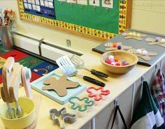 the table is covered with cookies and other crafting supplies