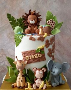 there is a cake with animals on it