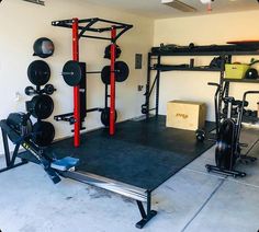 a home gym with various equipment in it