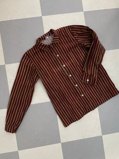 This is a preppy vintage shirt from Finnish company Marimekko. Classic style Jokapoika shirt, child approx 150-160cl. (size label is missing). Bordeaux and Green stripes. Very nice design, pocket and classic metal buttons in the front.  Nice crispy cotton cloth. very Good condition.  Don't hesitate to ask for Measurements in CM or inches.  Chest is 100cm. Made in Suomi Finland. ♪♫♬ Cotton Long Sleeve School Shirt, Fall Daywear Shirt With Striped Collar, Green Long Sleeve Shirt With Striped Collar, Fall Season Striped Collar Shirt For Daywear, Retro Long Sleeve Relaxed Fit Blouse, Retro Blouse With Relaxed Fit And Long Sleeves, Preppy Long Sleeve Shirt For Daywear, Classic Cotton School Blouse, Retro Long Sleeve Tops For School