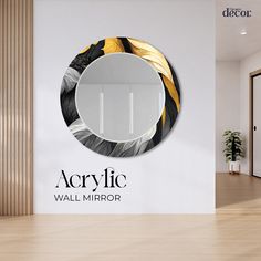 the logo for acrylic wall mirror is displayed in front of a white wall