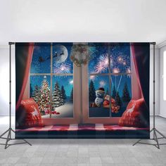 a christmas window scene with snowmen and fireworks