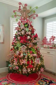 a christmas tree decorated with candy canes and ornaments