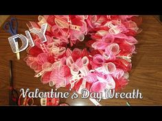 a valentine's day wreath with scissors and other items