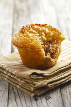 a pastry sitting on top of a napkin