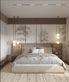 a large bed sitting in the middle of a bedroom next to two lamps on either side of it