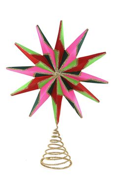 a red, green and pink paper star ornament