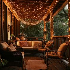 a porch covered in lights and furniture