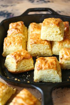 several pieces of bread sitting in a pan