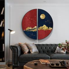 a living room with two circular paintings on the wall