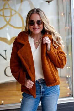 Stay warm and stylish with this cozy camel coat! Made with thick fuzzy material, it's perfect for those chilly days. Features front buttons and pockets for convenience. Never go back to being cold again! 100% Polyester Model 5'7" Size 5/27 Wearing Medium