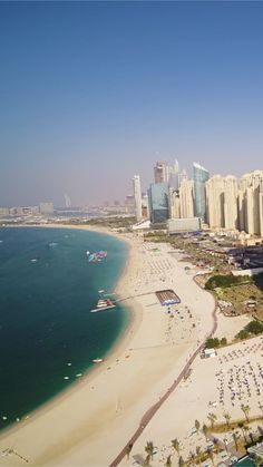 an aerial view of the beach and buildings in abura, united arab emiratesid