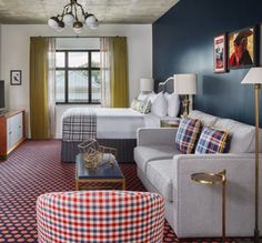 a living room filled with furniture and a flat screen tv