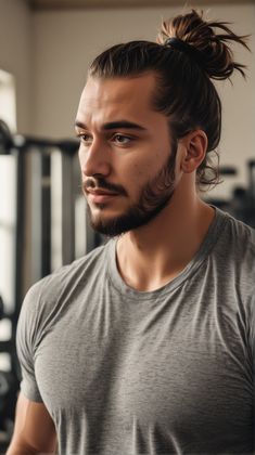 The man bun is a popular choice for those who want to keep their hair out of their face while still looking trendy. This style works well for men with medium to thick hair. Men Man Bun, Long Hair Haircuts, Man Bun Styles, Knot Hairstyles, Sleek Wedding, Long Hair Highlights, Surfer Hair, Shaggy Long Hair