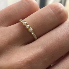 3 PEARL BAGUETTE EQUILIBRIUM RING Pearl Wedding Band, Unique Wedding Bands For Women, Pearl Wedding Bands, Baguette Diamond Wedding Band, Vintage Diamond Wedding Bands, Jennie Kwon, Simple Rings, Wedding Simple, Pearl Rings