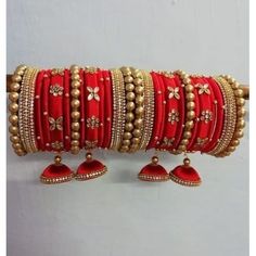 "Traditional Handmade Silk Thread Kundan Stone Studded Bangle Chuda Set Fashion Jewelry For Women Wedding Festive Party Wear Kada Set BANGLE SIZE -  2.4\" Inches, 2.6\" Inches, 2.8\" Inches, 2.10\" Inches Weight - 125 gm  Material: Silk Thread Color: As Per Picture The Bangles are decorated with beautiful stone. It makes your look noble and adds your charming Package include Set Of Silk Thread Bangles Fantastic Hand Kada for weddings, proms, parties or other special occasions * Specially Made For Traditional Occasions. * Used For Hands, It Can Be Reused. * For Bridal bridesmaids." Handmade Bangle For Wedding And Festivals, Handmade Bangle For Marriage And Festivals, Zari Work Bangle For Diwali Party, Diwali Party Bangle With Zari Work, Red Bracelets For Marriage And Festivals, Zari Work Bracelets For Diwali Party, Diwali Party Bracelets With Zari Work, Bollywood Style Bracelets With Zari Work For Parties, Bollywood Zari Work Bracelets For Party