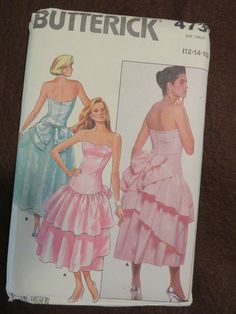 a women's dress pattern with ruffles on the skirt and bustle