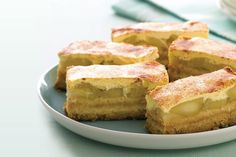 several pieces of cake sitting on a plate