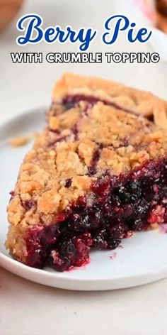 berry pie with crumble topping on a white plate