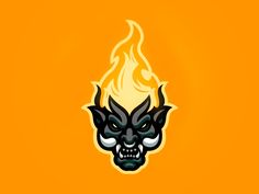 a black and yellow fire demon face on an orange background