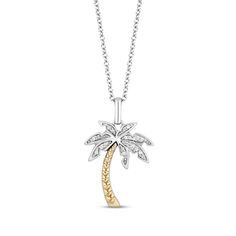 This necklace from the Disney Treasures collection is inspired by the endearing moments Lilo and Stitch bring to life. The shimmering palm tree pendant hearkens back to the beautiful island. A gleaming 10K yellow gold trunk rests below its palm fronds adorned in bright round-cut diamonds. Crafted in sterling silver, the silhouette has a total diamond weight of 1/20 carat. The 17-inch cable chain with 2-inch extension secures with a spring ring clasp. Available exclusively at KAY Jewelers. ©Disne Palm Tree Necklace, Disney Treasures, Palm Tree Pendant, Palm Fronds, Kay Jewelers, Tree Necklace, Tree Pendant, Accessories Jewelry Necklace, Lilo And Stitch