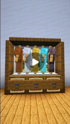 an animated image of some clothes in a room with wood flooring and a video screen