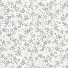 a blue and white wallpaper with small flowers on the bottom half of it,