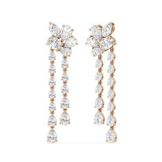 The Mosaic Chandelier Earrings are a masterpiece made to captivate the senses. This delicate pair of earrings features a radiant post formed by a cluster of pear and marquise cut diamonds. Twin linear drops detailed with pear-cut diamonds in tapering sizes suspend from the post, gently swaying and sparkling as you move. Elegant Cluster Earrings With Sparkling Stones, Luxury Cluster Wedding Earrings, Elegant White Cluster Bridal Earrings, Elegant Cluster Earrings With Sparkling Details, Blue Wedding Band, Rain Lily, Cluster Chandelier, Something Blue Wedding, Gorgeous Engagement Ring