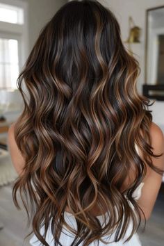 Long wavy hair with rich brown and caramel highlights. Balayage Ideas For Dark Hair, Dark Brown Hair Balayage Caramel, Dark Hair With Caramel Balayage, Cinnamon Balayage Hair, Dark Hair Dimension, Chocolate Brown Balayage Caramel, Cinnamon Brown Highlights, Brown Dimensional Hair, Cappuccino Hair