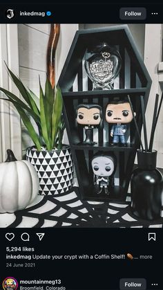 an instagram with two pop figures on it and some fake pumpkins in the background