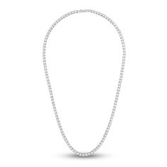 Breathtaking round natural white topaz gemstones animate the entire length of this distinguished men's tennis necklace. Fashioned in sterling silver, the 22-inch necklace secures in place with a box clasp. The signature "E" is stamped on the clasp to identify each piece as part of the 1933 by Esquire men's collection. Classic White Tennis Necklace For Gift, Classic White Tennis Necklace Gift, Classic White Tennis Necklace With Brilliant Cut, Classic White Tennis Necklace Brilliant Cut, White Single Strand Luxury Tennis Necklace, Timeless White Round Tennis Necklace, Classic Tennis Necklace With 17 Jewels For Anniversary, Timeless White Tennis Necklace With Round Cut, Timeless White Round Cut Tennis Necklace