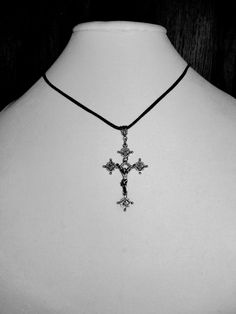 "Antiqued silvertone metal crucifix and antiqued silvertone metal bail necklace.  Hanging on a black satin cord with silvertone metal cord endcaps, silvertone metal lobster claw clasp and silvertone metal 1 1/2\" chain extender chain." Elegant Crucifix Metal Necklace, Black Metal Crucifix Cross Necklace, Antique Silver Crucifix Necklace For Gift, Black Metal Crucifix Necklace, Vintage Metal Crucifix Necklace, Rock Star Outfit, Crucifix Necklace, Dope Jewelry Accessories, Pierced Jewelry