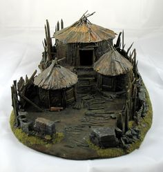 a small village made out of clay and grass