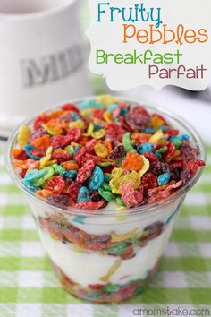 a bowl filled with cereal sitting on top of a green and white checkered table cloth