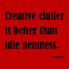 a red background with black text that says creative clutter is better than idle neatness