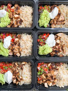 four plastic trays filled with rice, meat and veggies on top of each other