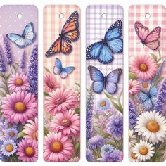 three bookmarks with flowers and butterflies painted on the front, one in pink, one in blue