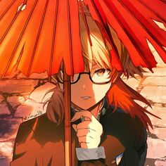 a girl with glasses holding an umbrella over her head