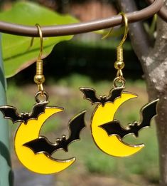 Halloween Moon Bat Charm Earrings,  flat, gold backs.  Lightweight.  Earrings measure about 1 inch tall, 1 inch wide, and a drop length of about 1 1/2 inches. Witchy Metal Halloween Earrings, Halloween Dangle Metal Earrings, Whimsical Halloween Earrings, Vintage Halloween Dangle Jewelry, Halloween Novelty Drop Earrings, Halloween Moon, Halloween Bat, Lightweight Earrings, Halloween Bats