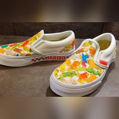 Nwot Vans Haribo Size 12 Slip Ons. Limited Edition. New Without Tags. Size 12 Kids. Gender Neutral. Haribo X Vans. 90s Style. Sold Out Online. Upgrade Your Junior's Style To The Next Level Wearing The Vans Kids Vans X Haribo Collection. Sku: #9856049 Leather And Textile Upper. Textile Lining And Comfy Footbed. Slip-On Style. Pull Tab At The Back. Round Toe Design. Rubber Outsole. Playful White Vans Sneakers, Cute Multicolor Vans Sneakers, White Non-slip Fun Sneakers, Non-slip White Sneakers, Fun White Non-slip Sneakers, Fun Non-slip White Sneakers, Vans Kids, Back Round, 90s Style