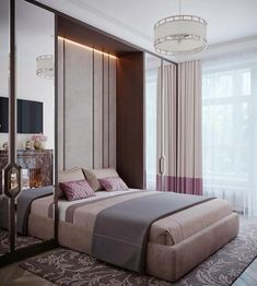 a bedroom with a large bed in the middle and a chandelier hanging from the ceiling