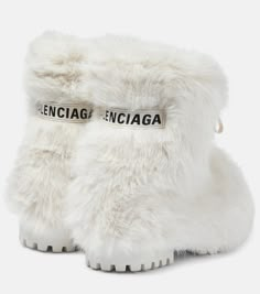 Find BALENCIAGA Alaska Faux Fur Snow Boots on Editorialist. Upper: faux fur. Lining: fabric. Sole: fur insole, rubber sole. Toe shape: round toe. Made in Italy. Includes: shoe box. Designer color name: Off White. Balenciaga Fur Boots, White Fur Boots, Bday Dress, Balenciaga Boots, Shoe Pics, Fur Snow Boots, Designer Suits For Men, Modest Style, Money Goals