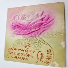 a birthday card with a pink rose on it and the words happy birthday written in cursive writing