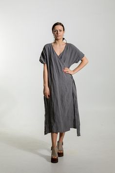 Linen dress, loose fitting, oversized linen dress, ankle length . Loose wrap linen dress with side splits. Model is 175 cm 59 tall, 60kg / 132 lb and wear size L, color grey Can be worn as a dress and with pants as a overdress . Made from 100% stone washed French linen Please choose the Dress Ankle Length, Linen Wrap Dress, French Linen, Dress With Pockets, Linen Dresses, Pure Linen, Model Dress, Linen Dress, Shirt Sleeves