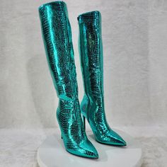 Green Metallic Festive Pointy Toe With Inseam Side Zipper Snake Skin Textured 4 Inch Stiletto Heel Brand New In Box. Elegant Green Boots For Party, Elegant Green Heeled Boots For Party, Green High Heeled Boots For Party, Trendy Green Heeled Boots For Party, Chic Green Heeled Boots For Party, Green Knee-high Party Boots, Green Knee-high Heeled Boots For Party, Trendy Almond Toe Heeled Boots For Party, Green Closed Toe Party Boots