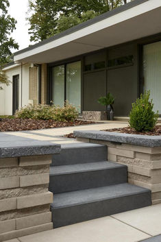 some steps leading to a house with trees in the background