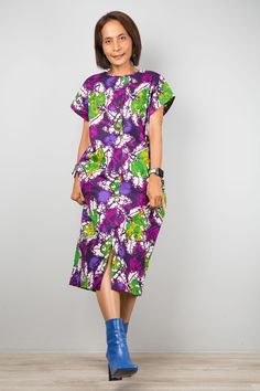 "Purple Ankara dress | African Print shirt Dress | holiday resort dress | Women's summer cotton dress  This women's dress is from a quality Ankara cotton and has very tidy sewing and is made with the highest care.   Original Design and produced by NUICHAN     PRODUCT SIZE : One Size Fits Most *Chest : up to 42\" *Sleeve length : 9\" (from neckline to hem) *Waist : up to 40\"   *Hips : up to 42\" *Length : 43\" from shoulder to hem NOTE :  * Model chest : 32\", waist : 24\" hips : 35\"  * Combine Printed Short Sleeve Shirt Dress For Beach, Summer Printed Short Sleeve Shirt Dress, Summer Printed Shirt Dress With Short Sleeves, Summer Midi Dress With Bold Print, Green Bold Print Summer Dress, Summer Cotton Maxi Dress With Vibrant Print, Summer Cotton Dresses With Vibrant Print, Cotton Dress With Vibrant Print For Vacation, Green Cotton Shirt Dress For The Beach