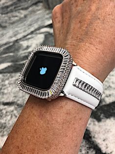 Fits the Apple Watch available for sizes 38,40,42,44,41,45,49mm Ultra in series 2,3,4,5,6,7,8 or SE. Look at the back of your watch for Both the correct millimeter size and series. Available to purchase together or individually. (Does not fit the white top ceramic version) This handmade Black baguette Apple white leather Watch band is Made with CRYSTALLIZED Swarovski Elements and or Lab diamond baguette Bezel (can be purchase as a set or just the Crystal band)It is genuine leather and the stones Luxury White Rectangular Watch Bands, Baguette Band, Rose Gold Apple Watch, Apple Watch Leather, Gold Apple Watch, Diamond Baguette, Gold Apple, Apple Watch Bands Leather, Leather Watch Bands