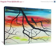 a painting on canvas of a tree branch with colorful sky in the background and clouds