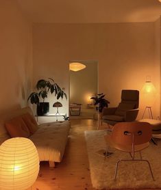 a living room filled with furniture and lights